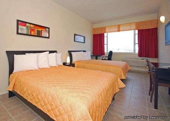 Comfort Inn & Suites Levittown Quarto foto